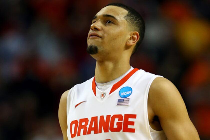 Syracuse's Tyler Ennis reacts after missing a shot in the closing seconds of his team's 55-53 loss to Dayton in the third round of the NCAA tournament. He is one of several top NBA prospects whose teams failed to advance to the Sweet 16.
