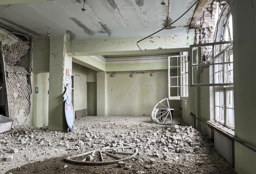 Debris on the floor on a damaged room.