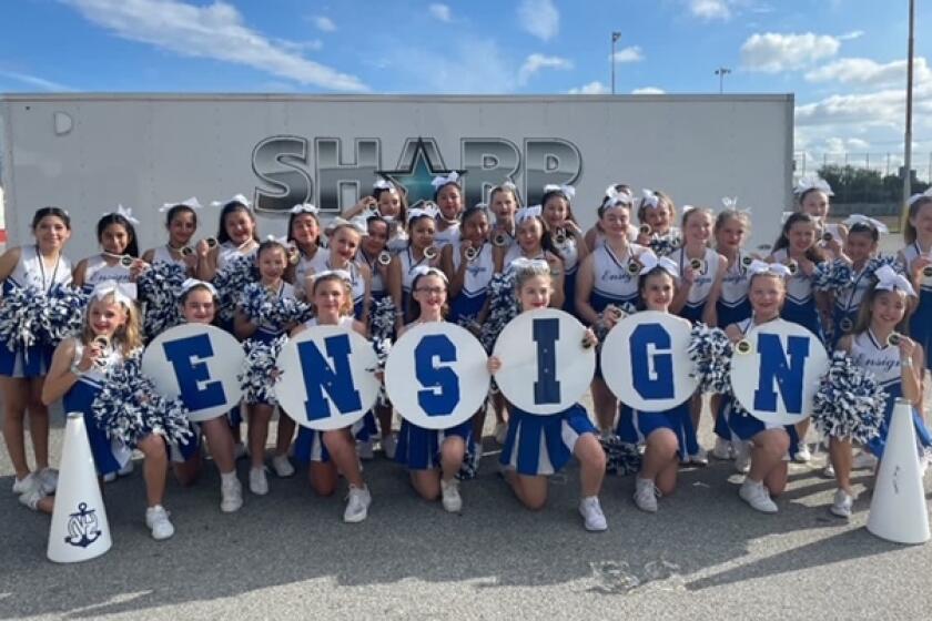 Cheerleaders from Ensign Middle School poses for a picture. They, and other cheer teams, will be at Newport Harbor High School on March 27.