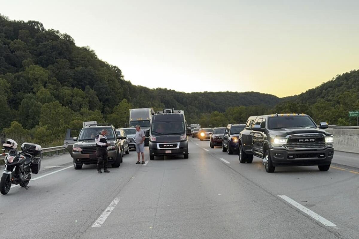 Vehicles are halted on the interstate.