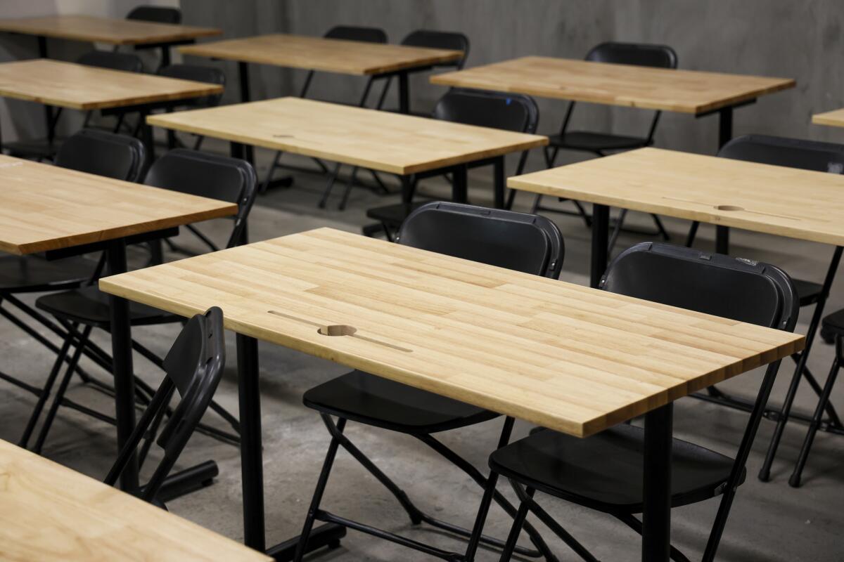 Chairs and tables in the room.