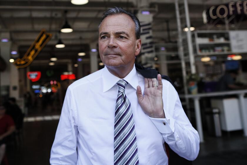 Rick Caruso tours Grand Central Market as he continues his campaign to become Mayor of LA. 