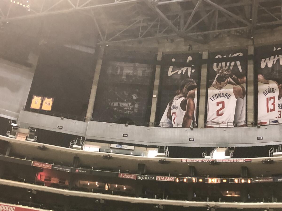 Kobe Bryant's jerseys remain uncovered ahead of a Clippers game against the Kings.