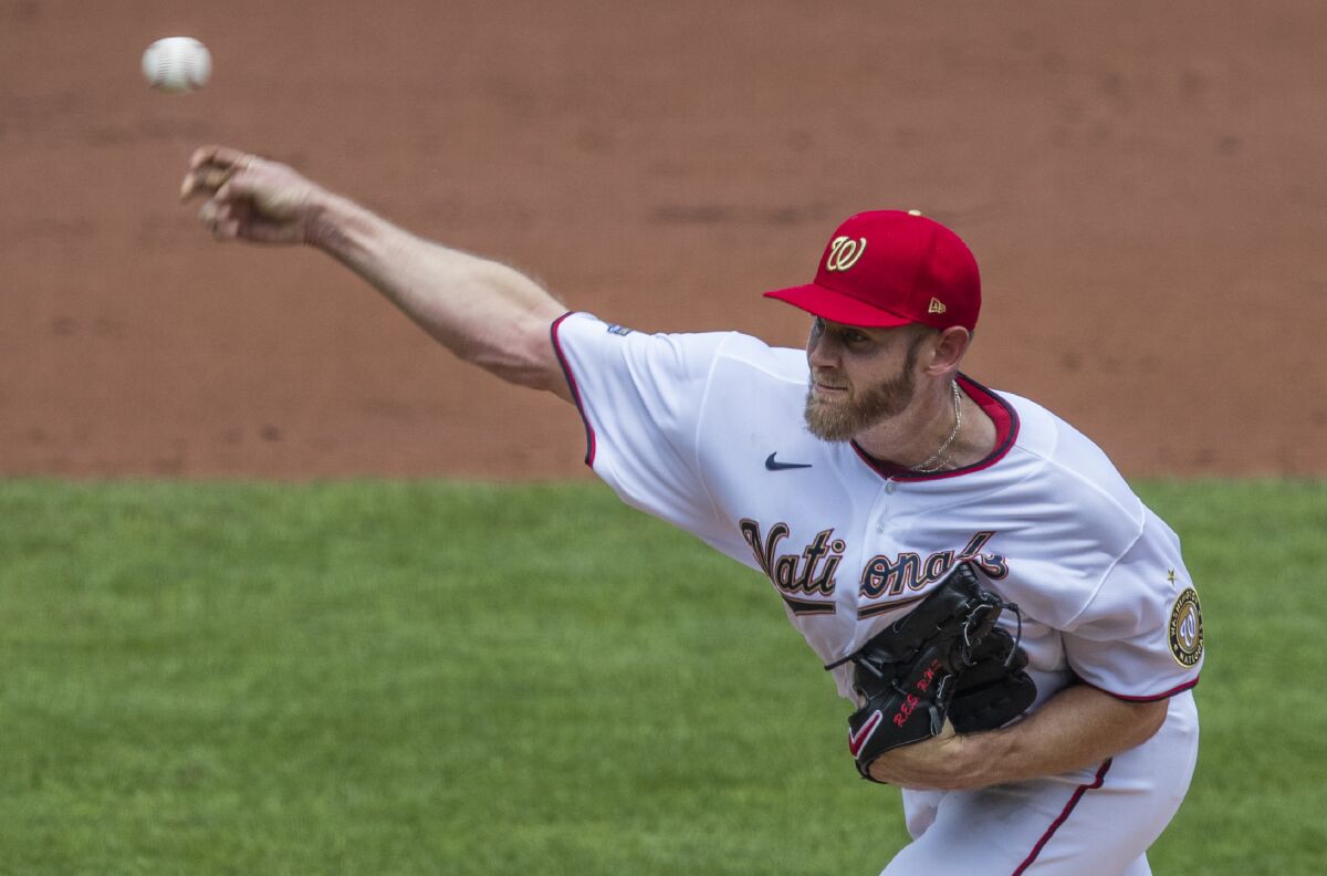 Washington Nationals starting pitcher Stephen Strasburg throws during the second inning of a baseball game against the Baltimore Orioles in Washington, Sunday, Aug. 9, 2020. (AP Photo/Manuel Balce Ceneta)