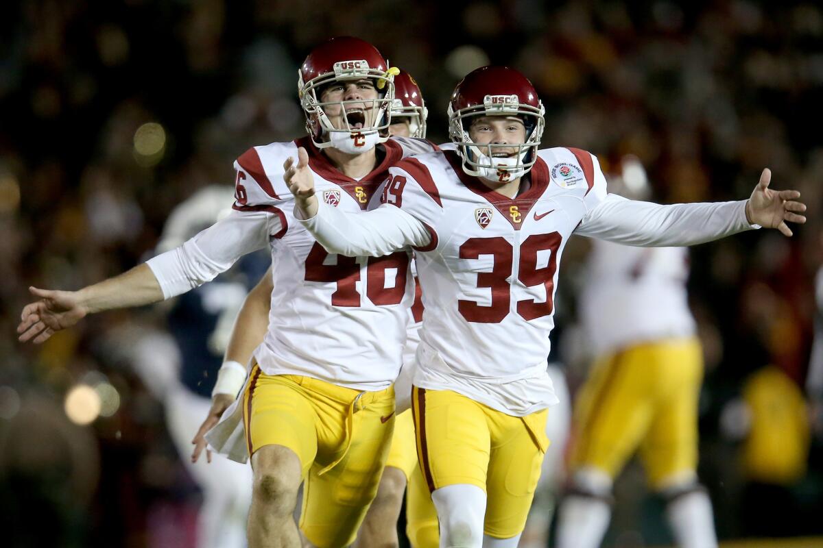 PASADENA, CA - JANUARY 02: Place kicker Matt Boermeester #39 of the USC Trojans (R) celebrates with teammates after making the game-winning 46-yard field goal in the fourth quarter to defeat the Penn State Nittany Lions 52-49 in the 2017 Rose Bowl Game presented by Northwestern Mutual at the Rose Bowl on January 2, 2017 in Pasadena, California. (Photo by Stephen Dunn/Getty Images) ** OUTS - ELSENT, FPG, CM - OUTS * NM, PH, VA if sourced by CT, LA or MoD **