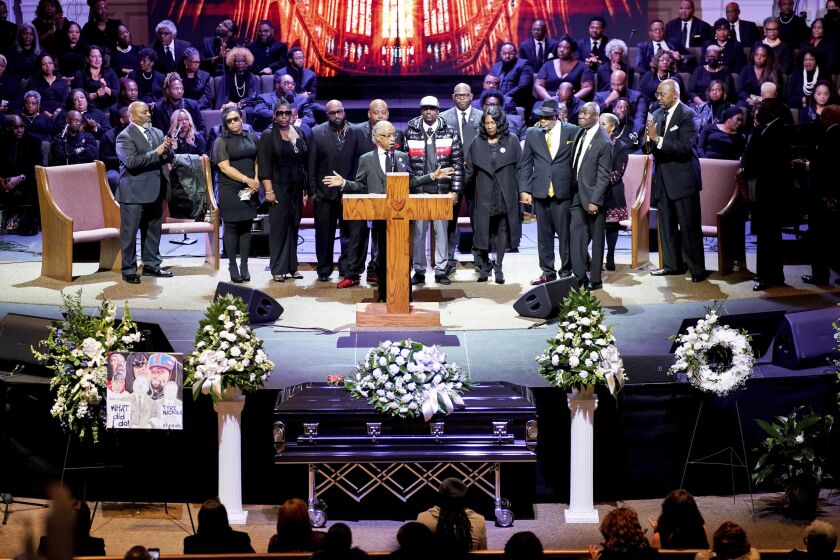 Rev. Al Sharpton introduces the family of Tyre Nichols during Nichols' funeral service at Mississippi Boulevard Christian Church in Memphis, Tenn., on Wednesday, Feb. 1, 2023. Nichols died following a brutal beating by Memphis police after a traffic stop. (Andrew Nelles/The Tennessean via AP, Pool)