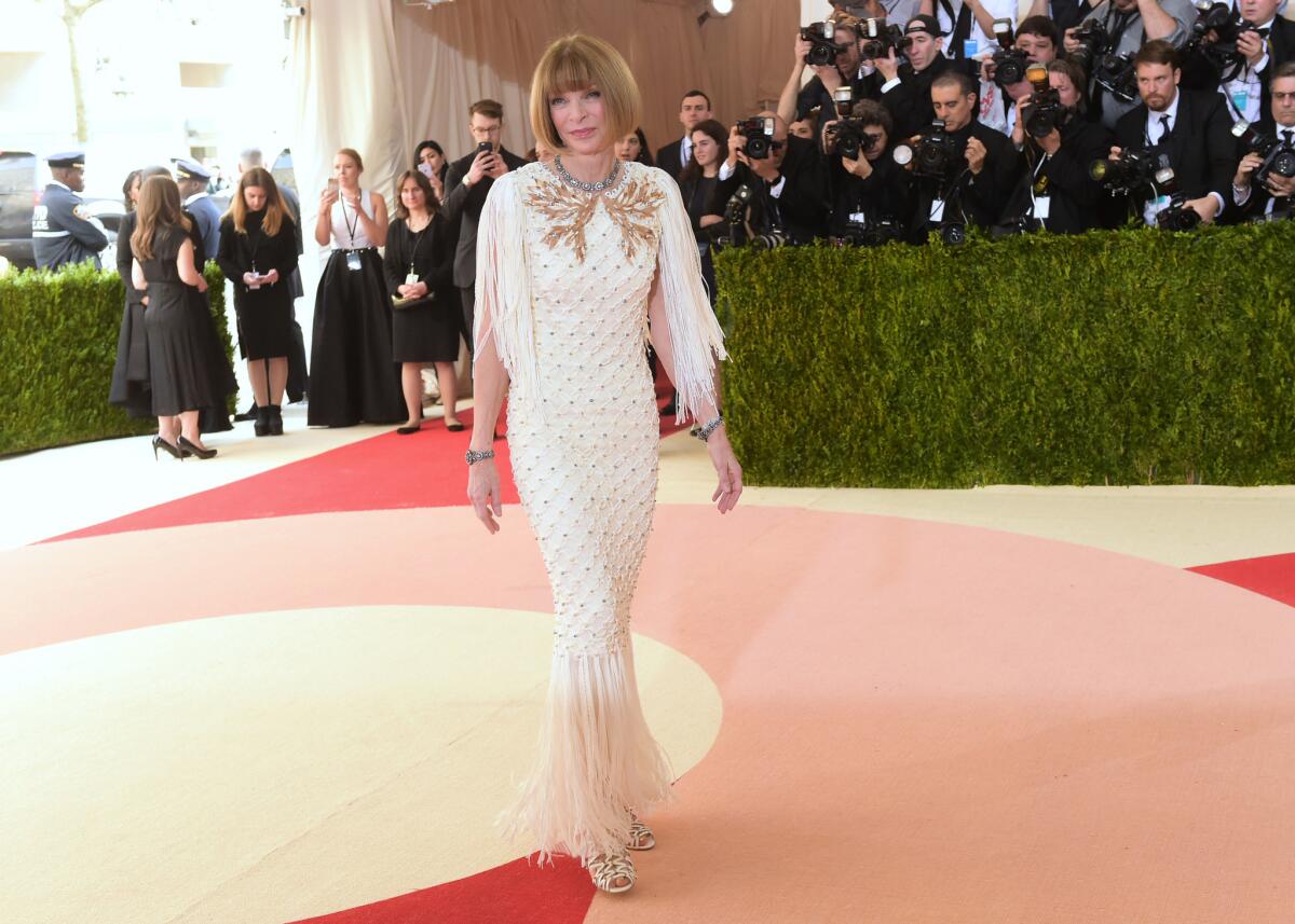 Vogue editor in chief Anna Wintour goes with a cream-colored fringe frock at the Met Gala.