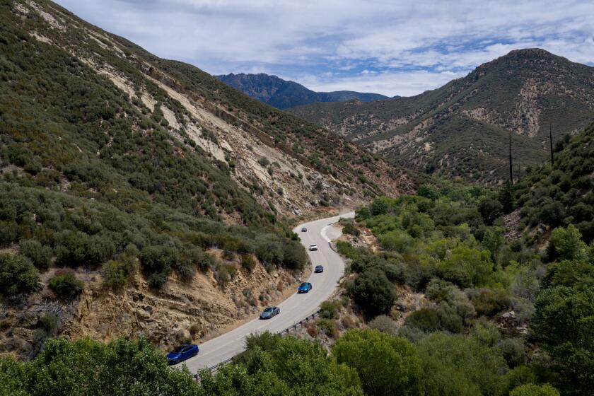 Ojai, CA - July 26, 2026: A group of friends drive their cars along State Route 33 on Sunday, July 26, 2026 near Ojai, CA. (Eric Thayer / Los Angeles Times)