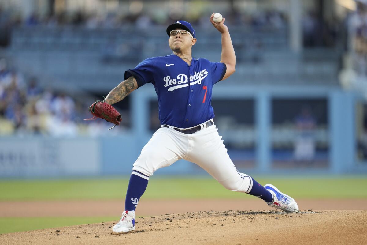 Dodgers pitcher Julio Urías throws during the first inning against the Oakland Athletics.