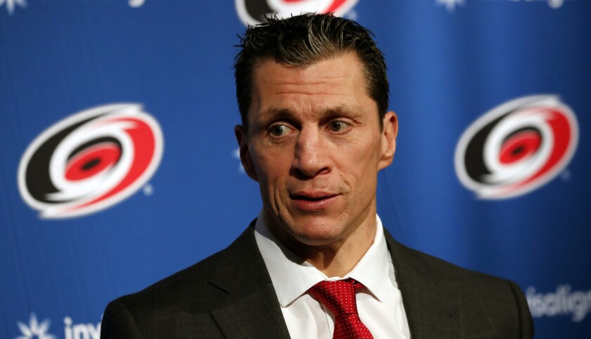 FILE - Carolina Hurricanes head coach Rod Brind 'Amour speaks at a press conference following an NHL hockey game against the Dallas Stars in Raleigh, N.C., in this Saturday, Feb. 16, 2019, file photo. The Carolina Hurricanes have reached a three-year contract extension with coach Rod Brind’Amour after three straight playoff appearances. The Hurricanes announced the agreement Thursday, June 17, 2021, a little more than a week after the Hurricanes were eliminated by reigning Stanley Cup champion Tampa Bay in the second round. (AP Photo/Karl B DeBlaker, File)