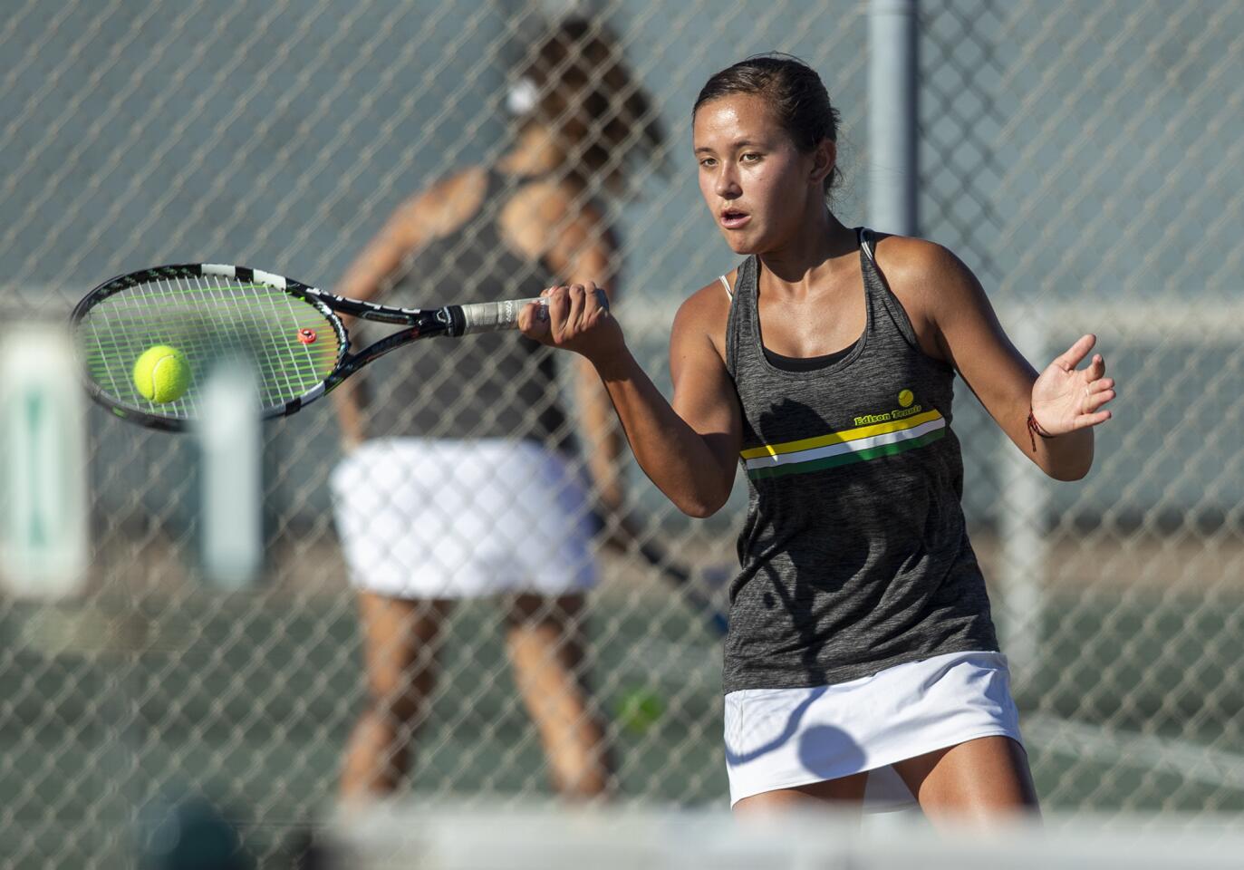 Edison's Kailee You returns a shot agaisnt Huntington Beach's Cindy Huinh during a Wave League match on Thursday, October 4.