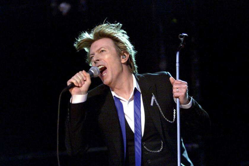David Bowie performs at the Verizon Wireless Amphitheater in Irvine on Aug. 13, 2002.