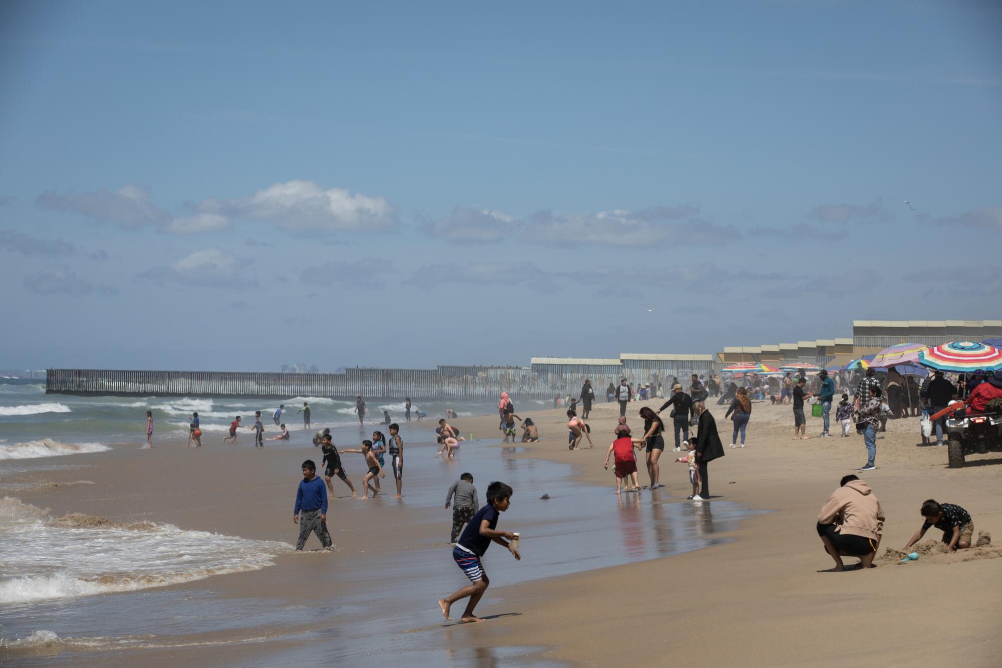 Hundreds of people spend time on Playas de Tijuana during Holy Week