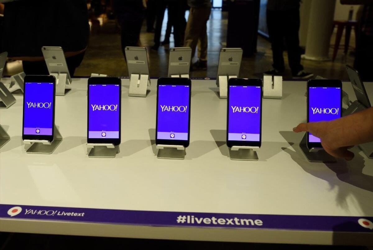 Phones are set up to demonstrate Livetext during a Yahoo news conference Wednesday.