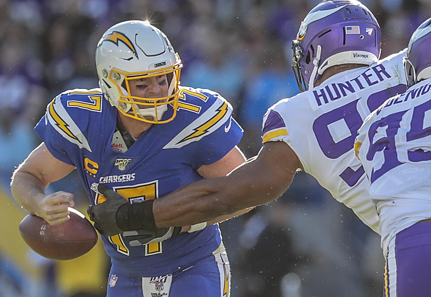 Minnesota Vikings defensive end Danielle Hunter strips the ball from Chargers quarterback Philip Rivers.