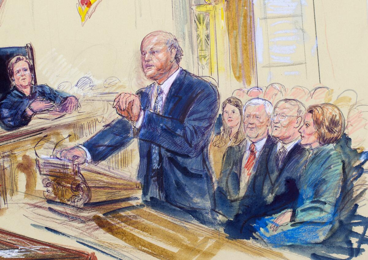 A courtroom artist's rendering shows Michael A. Carvin, lead attorney for the petitioners, speaking Wednesday before the Supreme Court in Washington. Justice Elena Kagan is shown at left, and sitting behind Carvin from left to right are Health and Human Services Secretary Sylvia Burwell, Sen. Orrin Hatch (R-Utah) Sen. Lamar Alexander (R-Tenn.) and House Minority Leader Nancy Pelosi (D-San Francisco).
