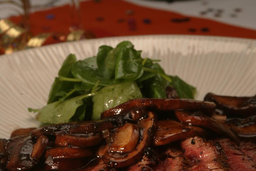 Steak au Poivre with Portobello sauce and watercress. Flambe recipes.