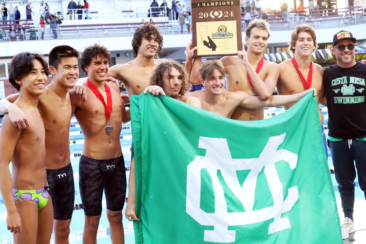 The Costa Mesa High boys' swim team is all smiles after winning the CIF Southern Section Division 2 finals on Friday.