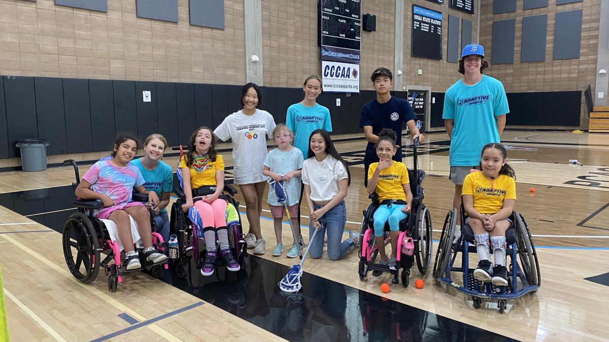CCA volunteers with participants at the 2022 Junior Adaptive Sports Camp.