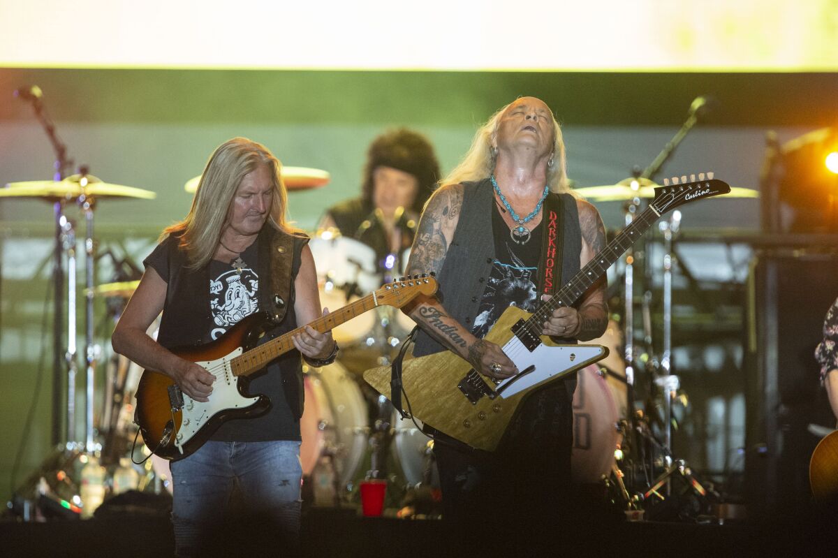 Guitarist Mark Matejka (left) performs with Lynyrd Skynyrd on June 4, 2021 in Panama City Beach, Fl.