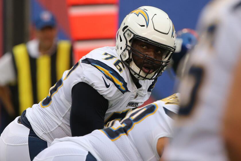 EAST RUTHERFORD, NJ - OCTOBER 08: Tackle Russell Okung #76 of the Los Angeles Chargers in action against the New York Giants during an NFL game at MetLife Stadium on October 8, 2017 in East Rutherford, New Jersey. The Los Angeles Chargers defeated the New York Giants 27-22. (Photo by Al Pereira/Getty Images)