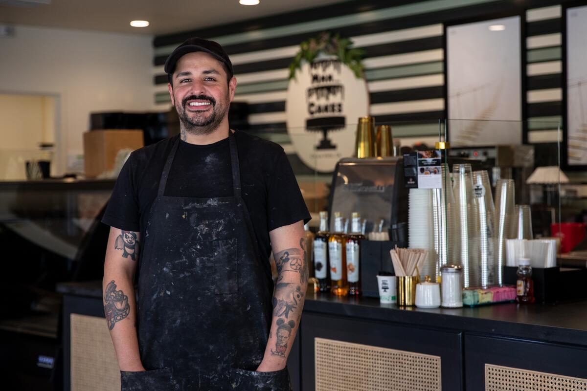 Baker and owner Jose Barajas stands at the front of the house of his bakery, Mmm… Cakes, on Oct. 21.