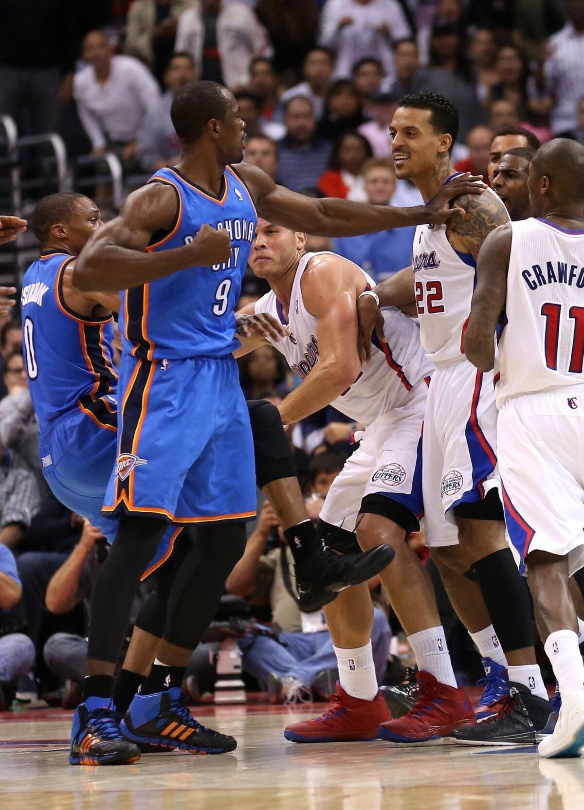 Oklahoma City's Serge Ibaka, left, confronts Clippers forward Matt Barnes during an altercation on Wednesday. Barnes was fined by the NBA on Thursday.