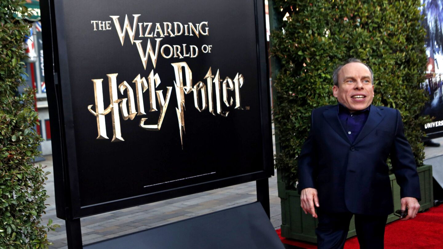 Actor Warwick Davis, who plays Professor Flitwick in the Harry Potter films, at the VIP debut of the Wizarding World of Harry Potter.