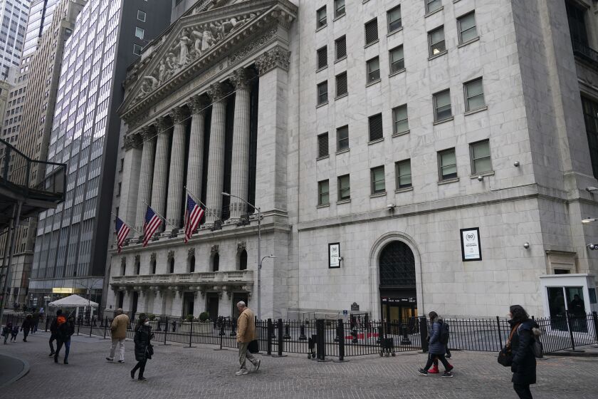 FILE - The New York Stock Exchange is seen in New York, Feb. 24, 2022. Major U.S. stock indexes are off to a mixed start on Wall Street Monday, April 4, 2022 while Twitter soared 22% after the company disclosed that Tesla CEO Elon Musk had taken a 9.2% stake in the social media platform. (AP Photo/Seth Wenig, file)