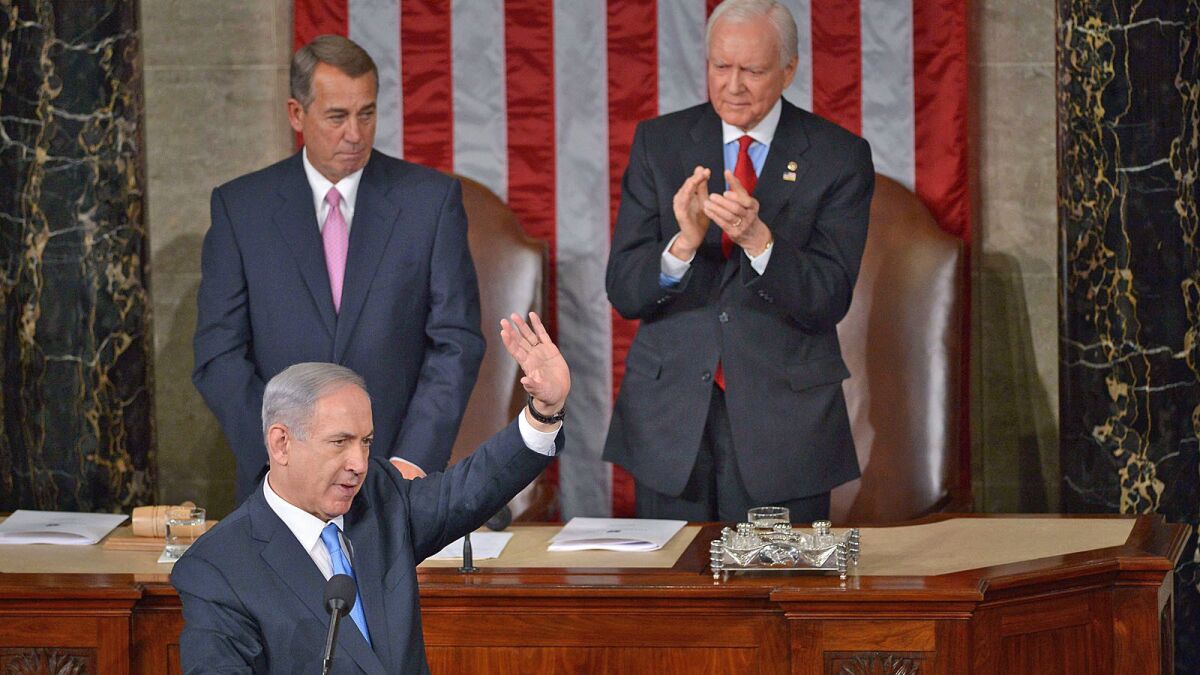 Israel's Prime Minister Benjamin Netanyahu waves following his address to a joint session of the U.S. Congress.