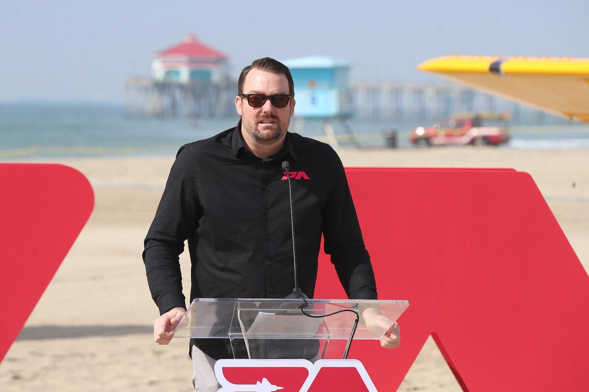 Pacific Airshow executive director Kevin Elliott makes comments at Thursday's press conference in Huntington Beach.