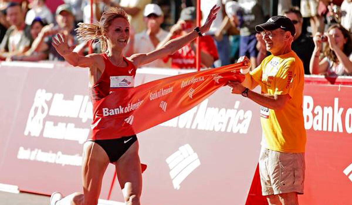 Liliya Shobukhova became the first woman to win the Chicago Marathon three times when she crossed the finish line in 2011.