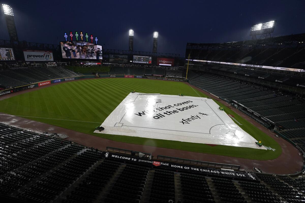 Baseball opener delayed by rain