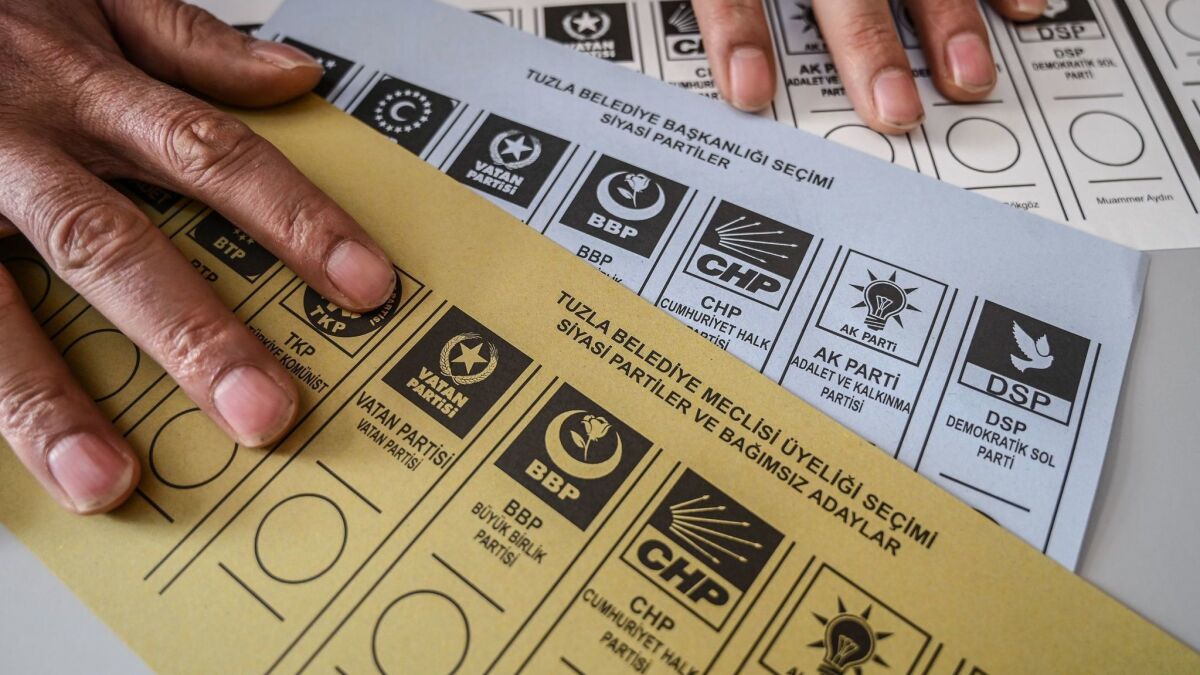 An electoral official preparing ballots during the local elections in Istanbul, Turkey, on March 31.