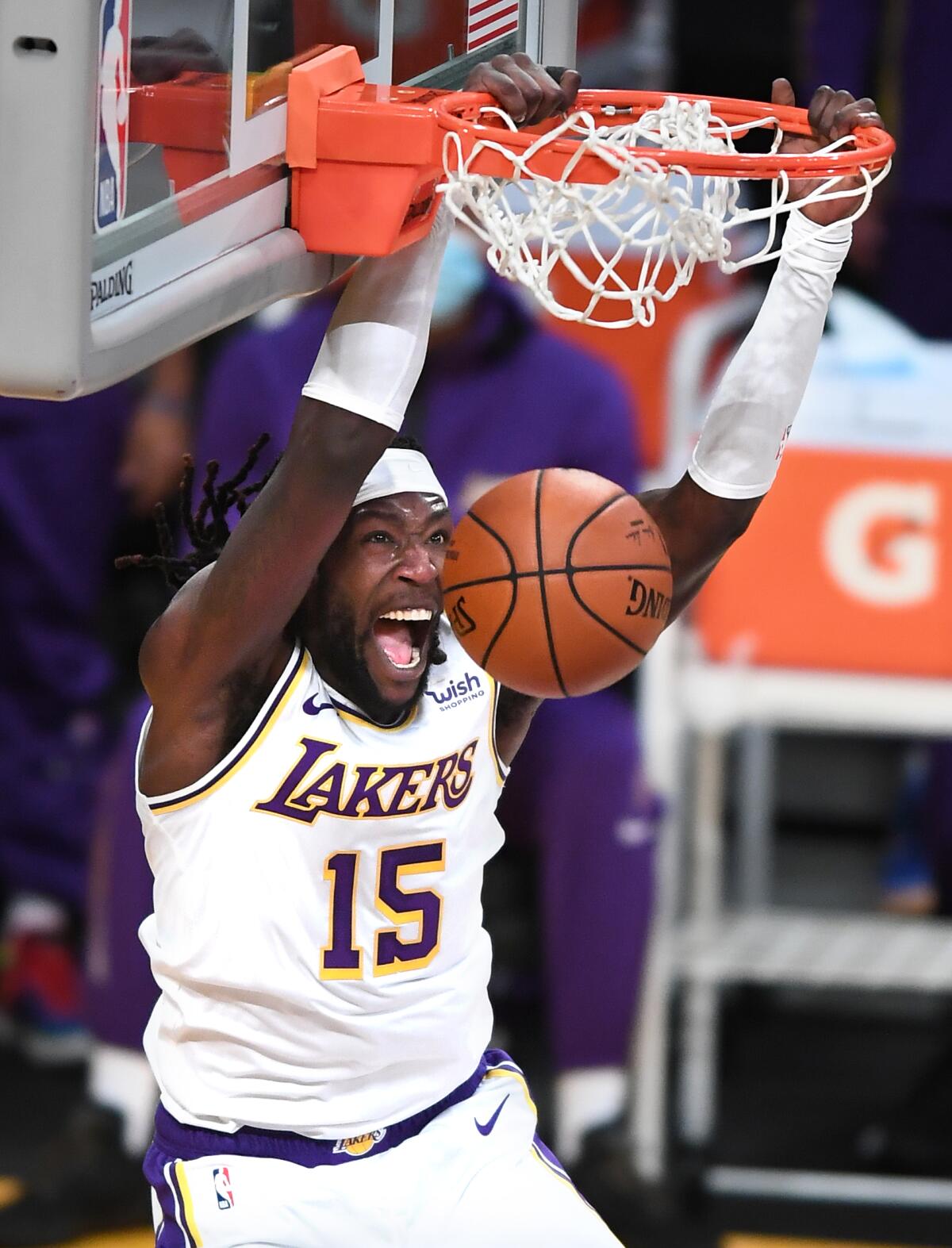 Lakers forward Montrezl Harrell dunks against the Clippers, his former team.