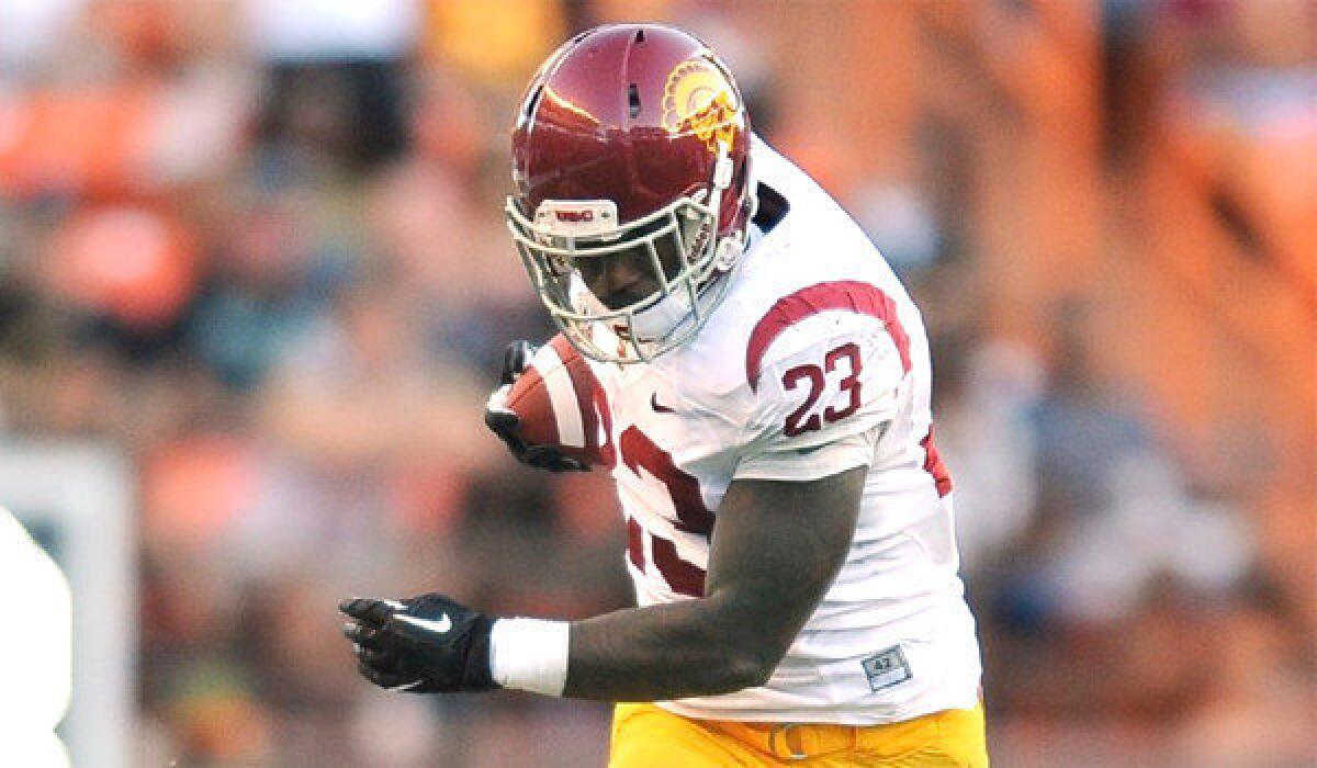 USC running back Tre Madden carried the ball 18 times for 109 yards for the Trojans in the school's 30-13 victory over Hawaii on Aug. 29, 2013.