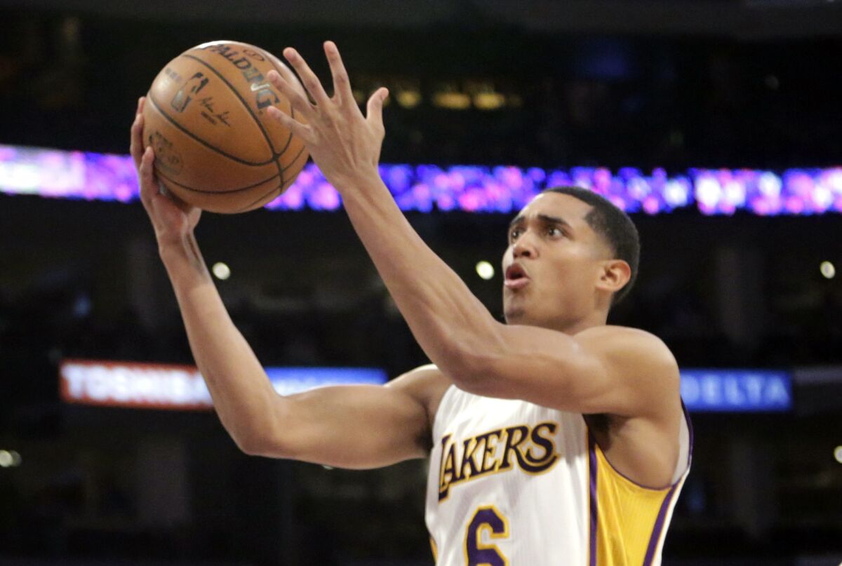 Jordan Clarkson drives to the basket for a layup against Pistons.