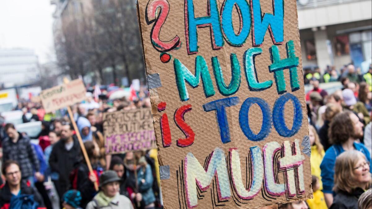 Germans demanding affordable housing protest in Berlin in 2018.