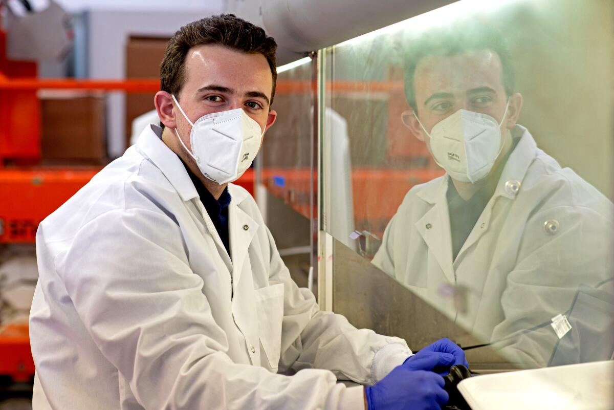 Curative founder Fred Turner wearing a lab coat and PPE