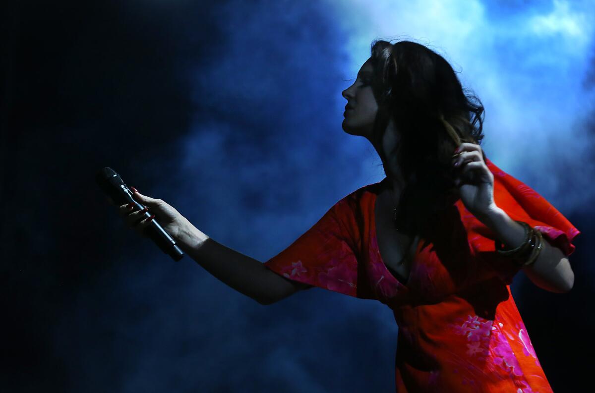 Lana Del Rey performs Sunday night at the Coachella Valley Music and Arts Festival in Indio.