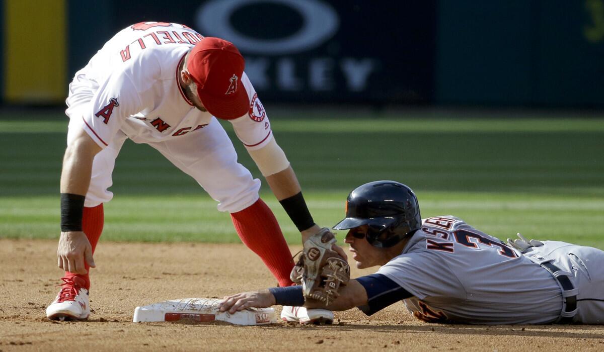 Detroit Tigers' Ian Kinsler steals second past Angels second baseman Johnny Giavotella during the fifth inning on Wednesday.
