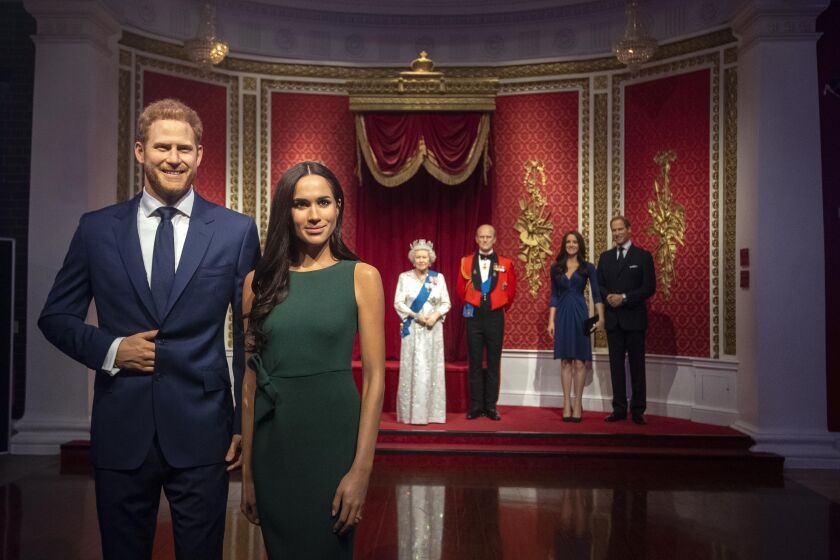 Meghan And Harry Wax Figures Booted At Madame Tussauds London Los Angeles Times
