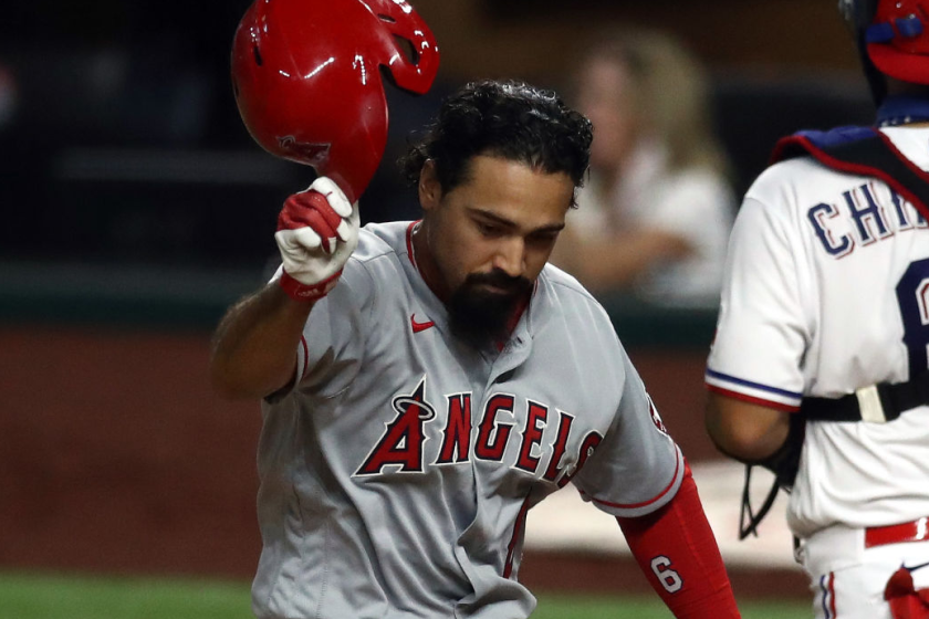 ARLINGTON, TEXAS - AUGUST 08: Anthony Rendon #6 of the Los Angeles Angels throws off his helmet.