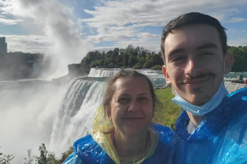 West Hollywood native Max Buydakov, right, stands next to his mother, Larisa Pereshivaylova, at Niagara Falls in August.