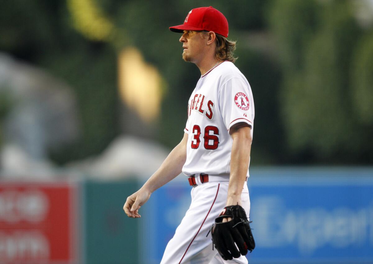Angels pitcher Jered Weaver walks off the field after the first inning of a game against the Arizona Diamondbacks on June 15.