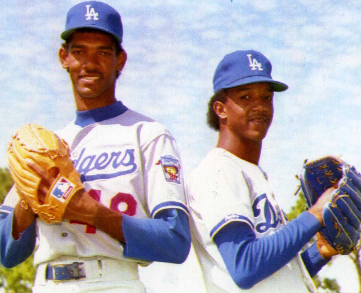 Ramon Martinez, left, and his brother Pedro with the Dodgers in 1992.