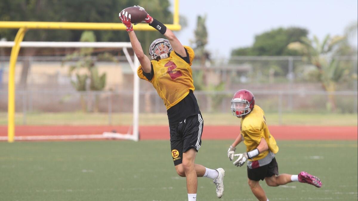 Hayden Pearce makes a catch during Estancia High's practice on Aug. 15. Pearce is one of the team's top two returning wide receivers.