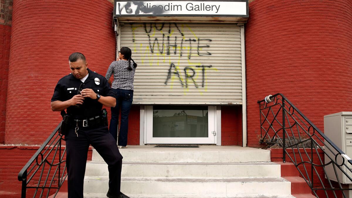 Police investigate vandalism at Nicodim Gallery on South Anderson Street in Boyle Heights. The presence of galleries has raised alarm about gentrification.