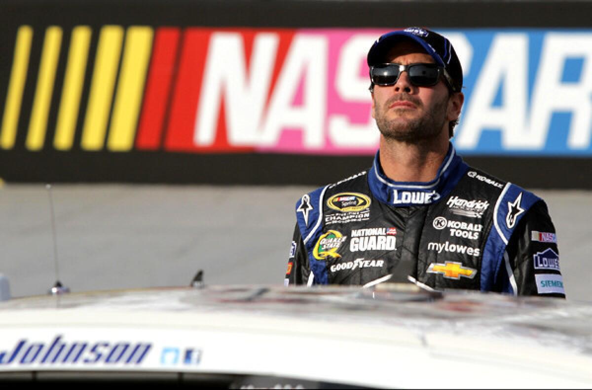 Jimmie Johnson looks on from the grid during qualifying at Bristol Motor Speedway last month.