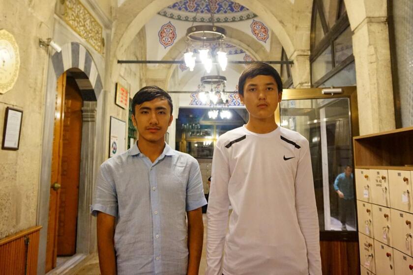 Adil Ahmad (right) ,15, from Yarakan, says his parents are in a re-education camp, and four of his siblings in China are missing, presumed in some kind of detention. Nuruddin (left), 16, says his parents are in a camp near their home in Urumchi.